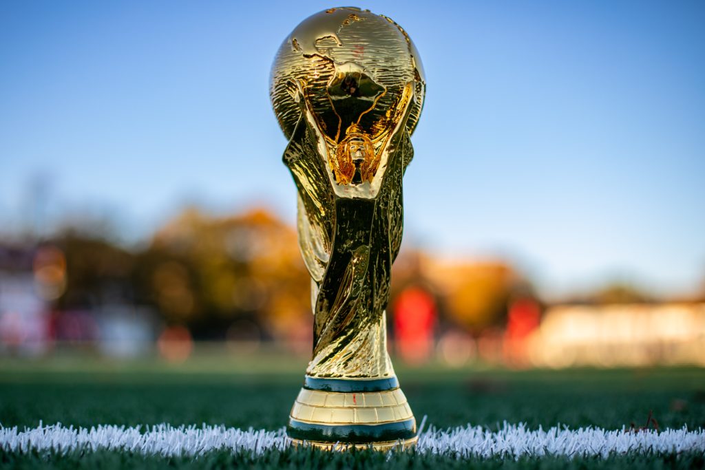 World Cup Trophy on soccer pitche