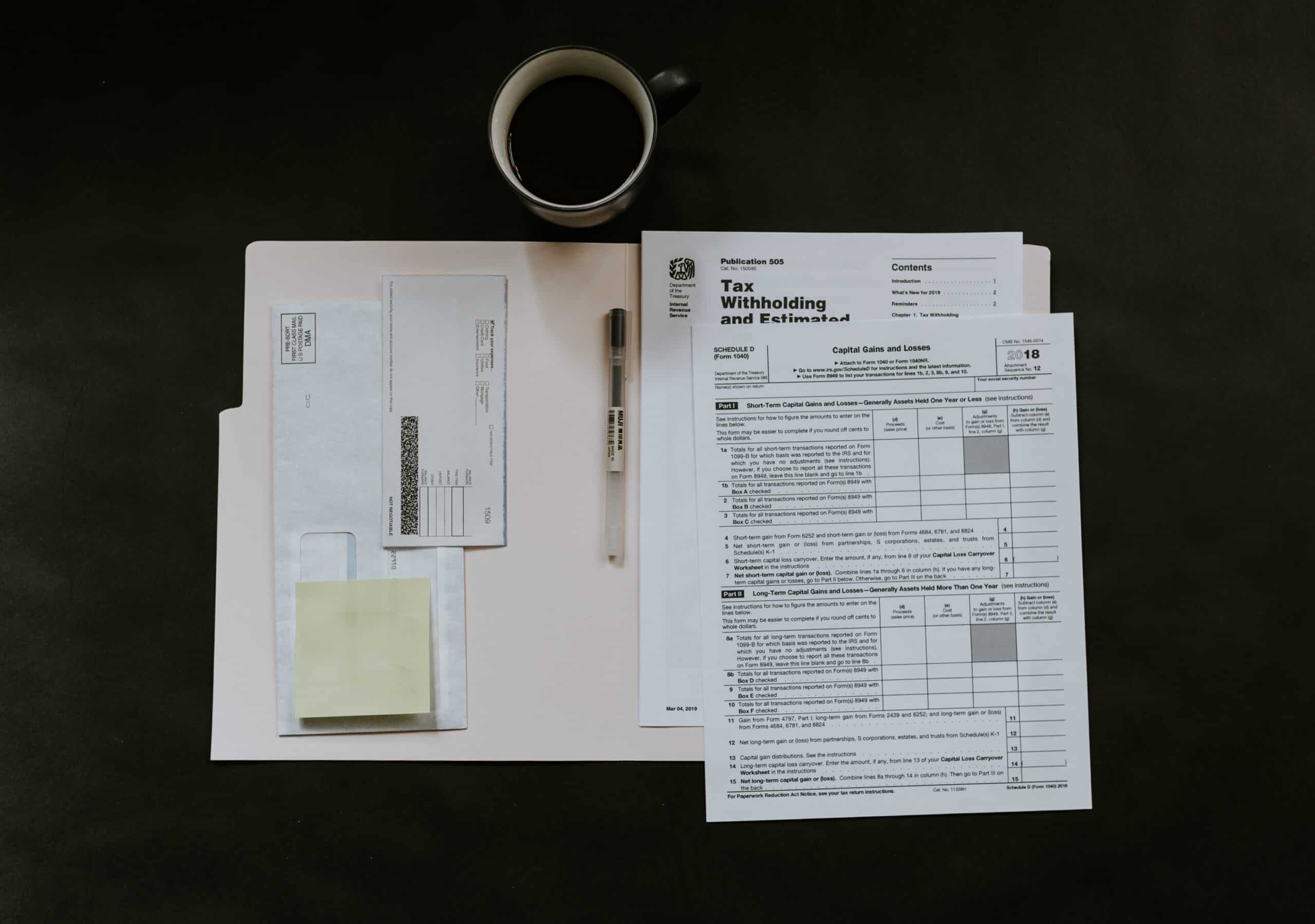 Tax documents and a cup of coffee