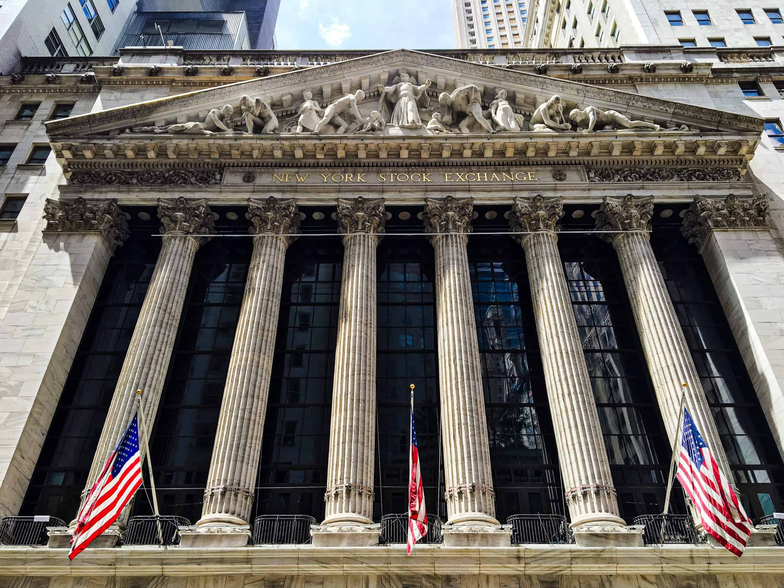 New York Stock Exchange building with American flags