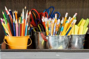 School supplies, pencils, highlighters, scissors