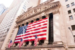 New York Stock Exchange building with American flags